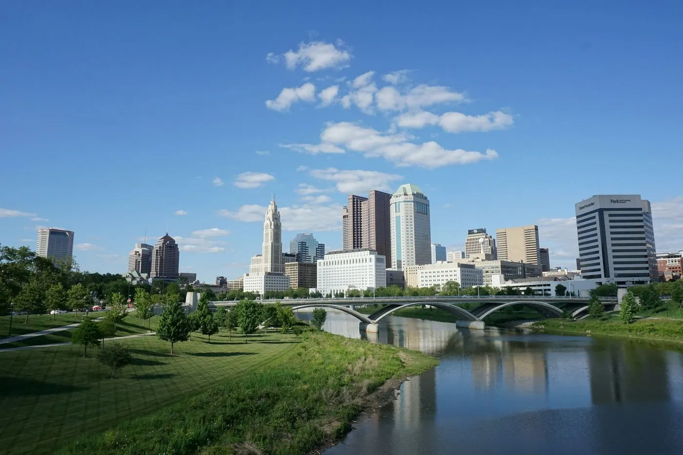 Downtown Columbus skyline across the Scioto River on a sunny day