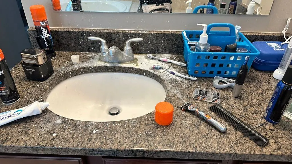 Before: the bathroom vanity counter, dirty