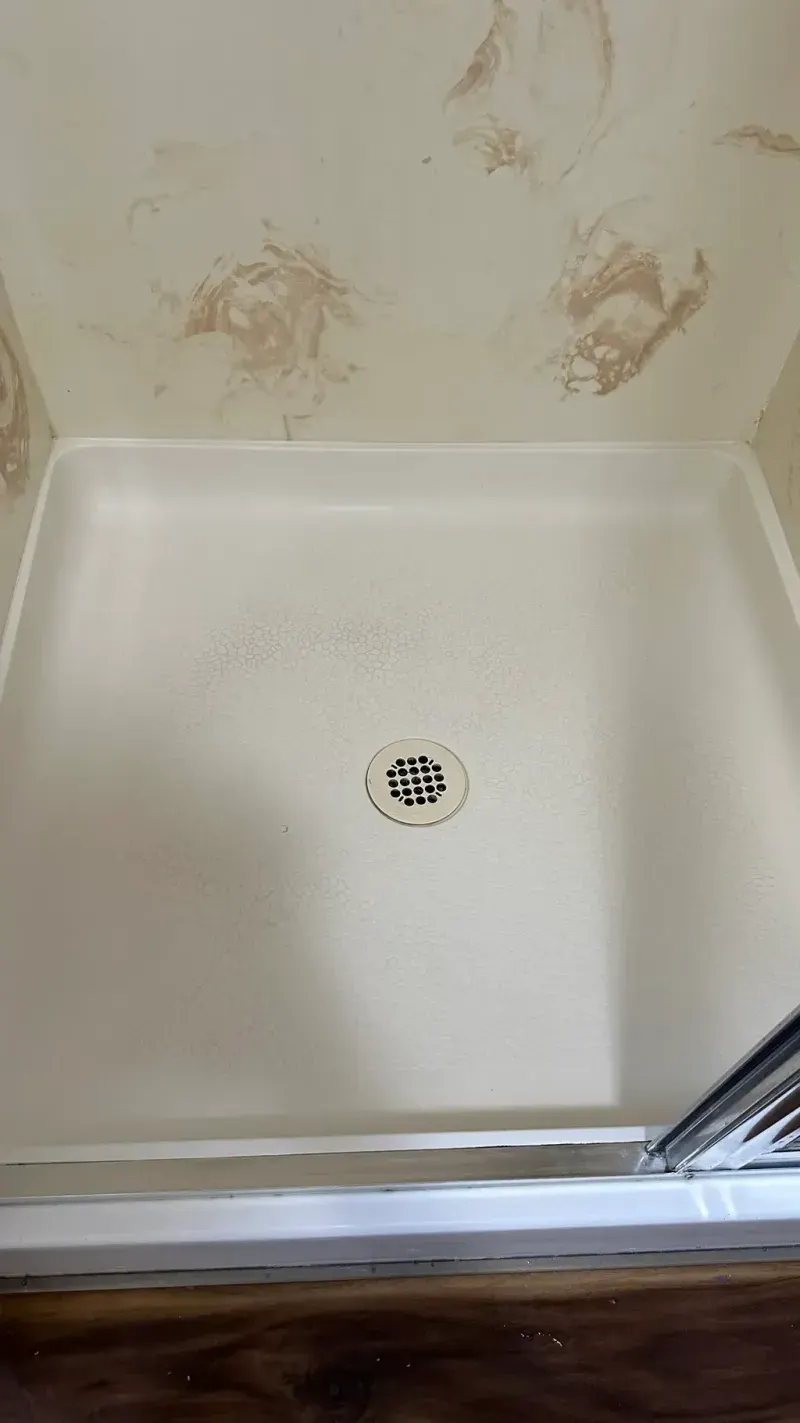 After: the shower base, clean
